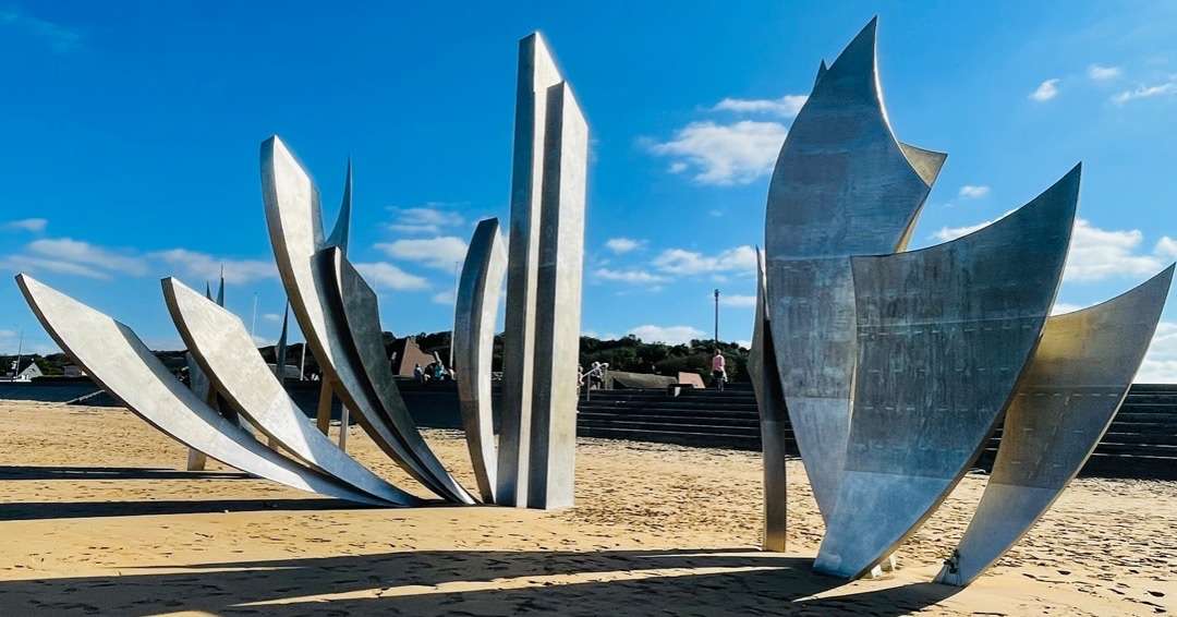 Modern statues on beach